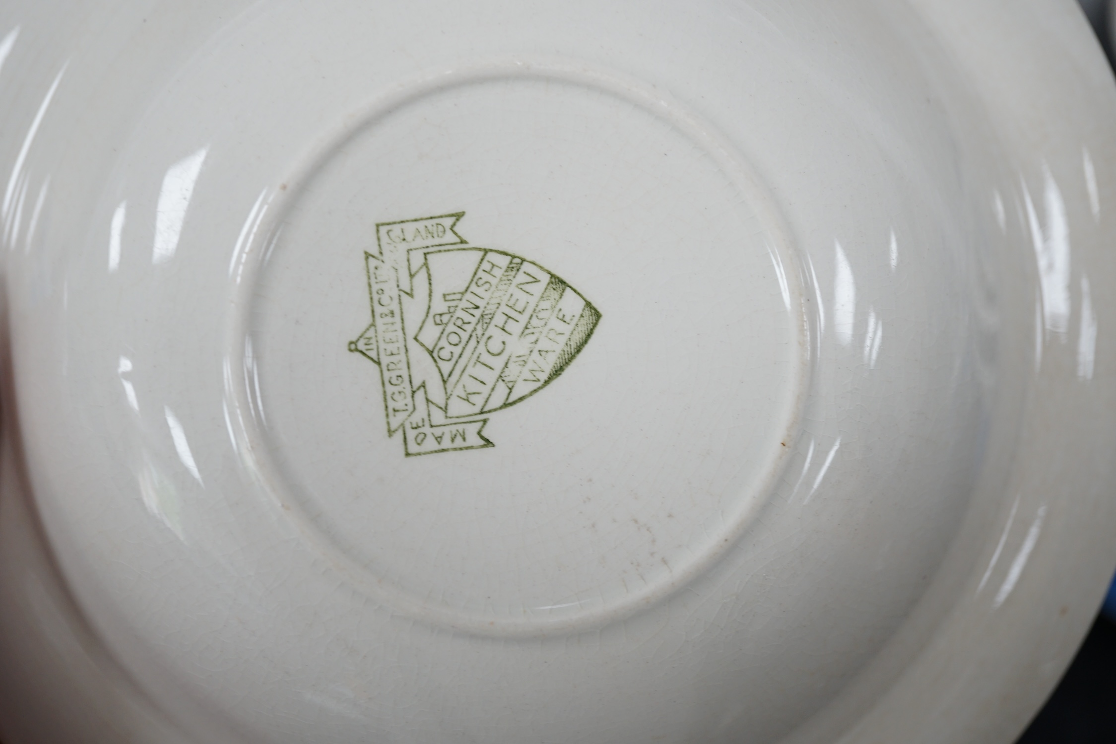 T.G.Green Cornish Kitchenware, a collection of tableware, to include lidded tureens, circular and oval plates, jelly moulds, etc. largest 35cm wide, approximately thirty five pieces, mainly Green Shield marks. Condition